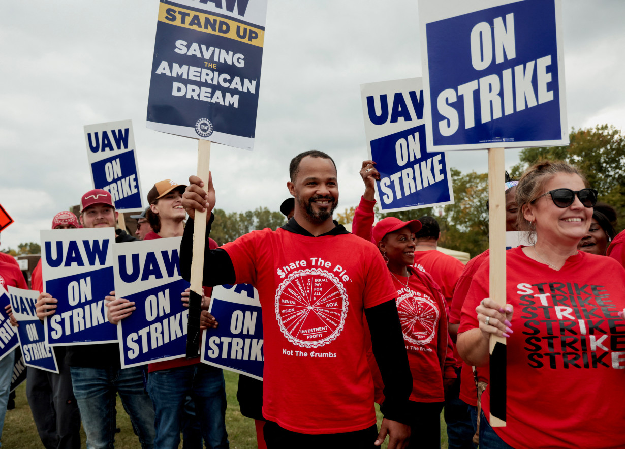 FILE PHOTO: Striking UAW members from the General Motors Lansing Delta Plant picket in Delta Township