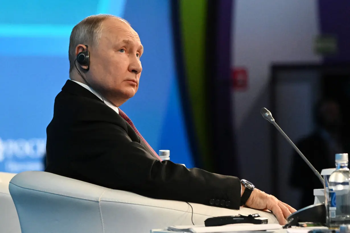 Russian President Putin attends the plenary session at the 2023 Russian Energy Week international forum in Moscow