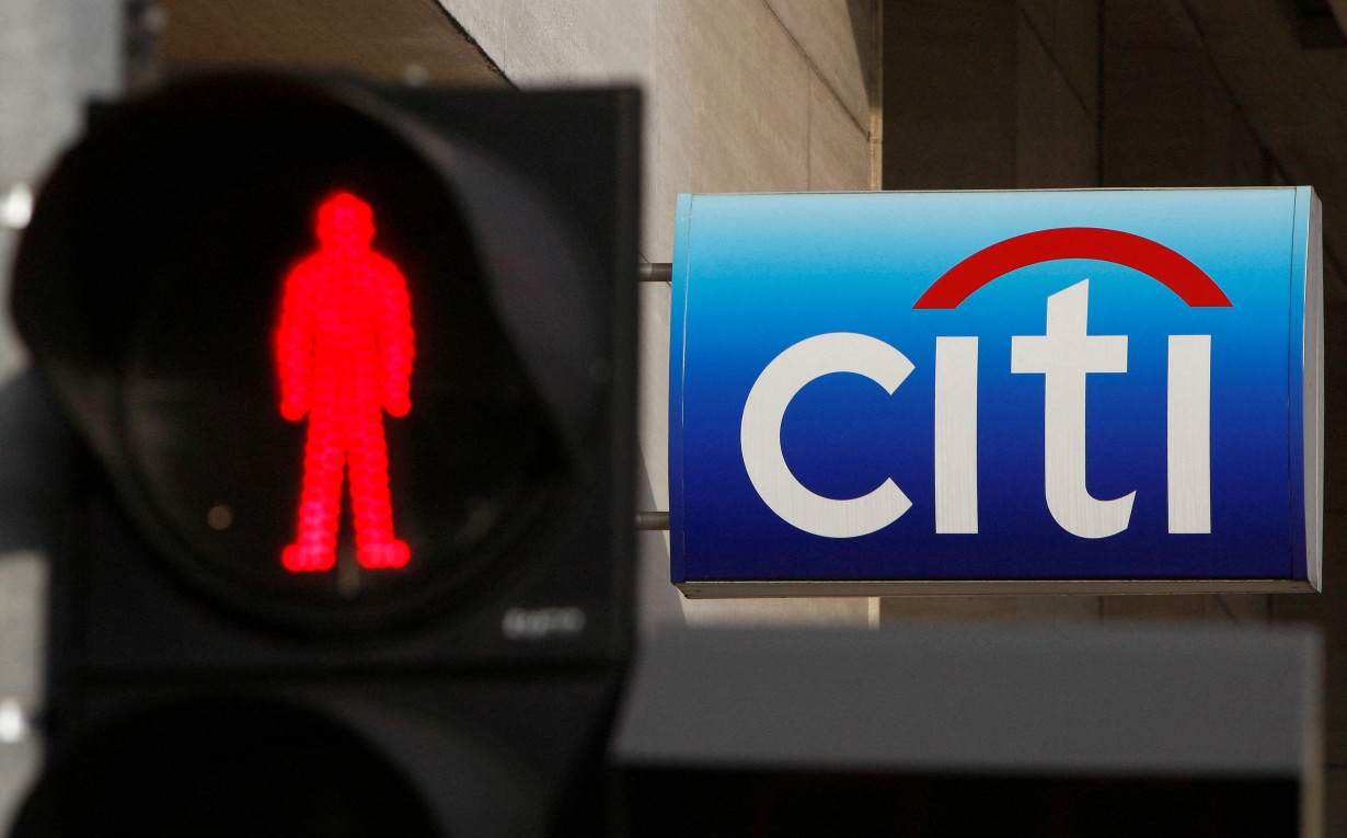 FILE PHOTO: A traffic light is pictured in front of a Citibank branch in Singapore