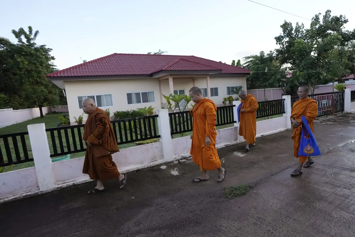 A modest Buddhist ceremony marks the anniversary of a day care center massacre in Thailand