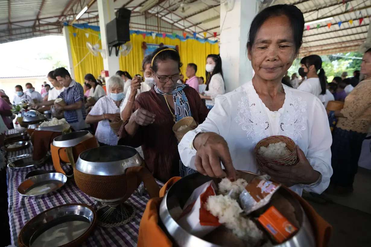 A modest Buddhist ceremony marks the anniversary of a day care center massacre in Thailand