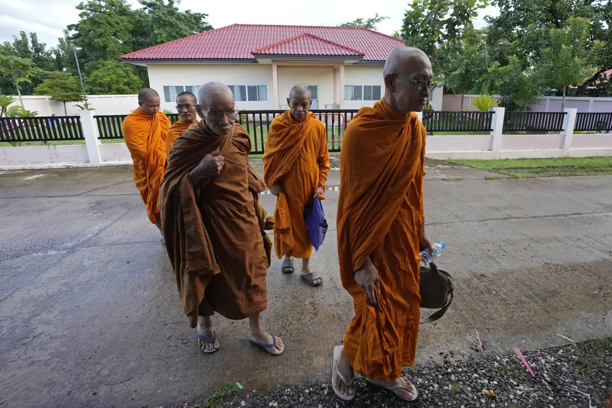 A modest Buddhist ceremony marks the anniversary of a day care center massacre in Thailand