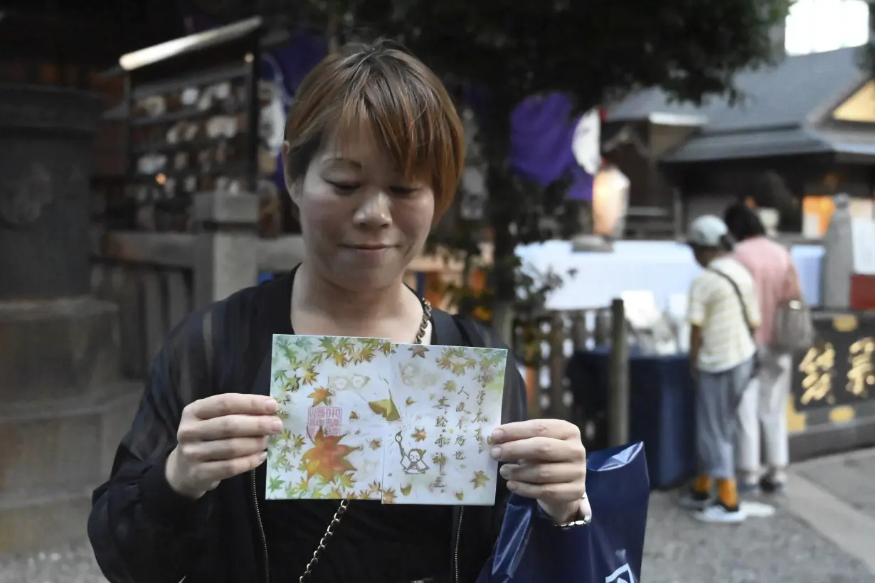 In secular Japan, what draws so many to temples and shrines? Stamp collecting and tradition