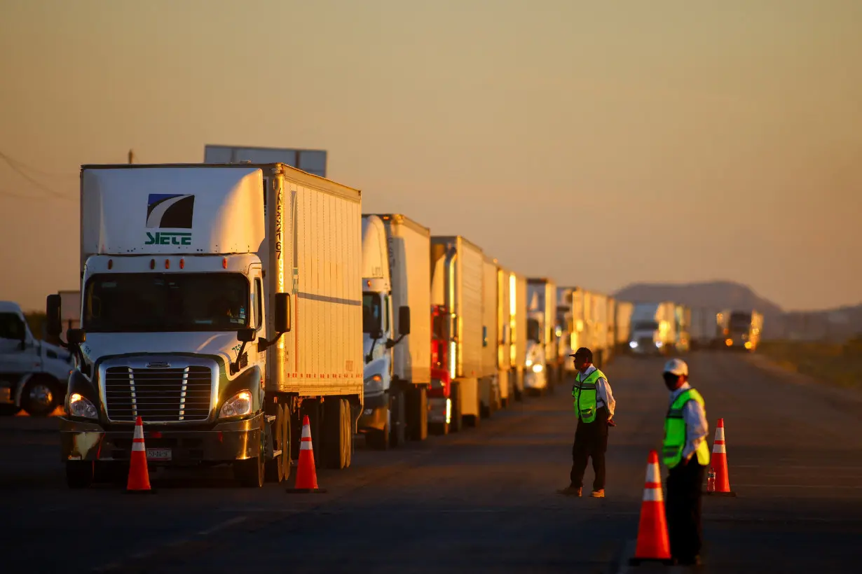 Costs mount as migration-related delays stall trucks at US-Mexico border