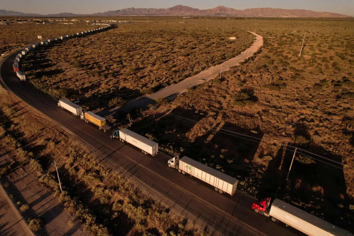 Costs mount as migration-related delays stall trucks at US-Mexico border