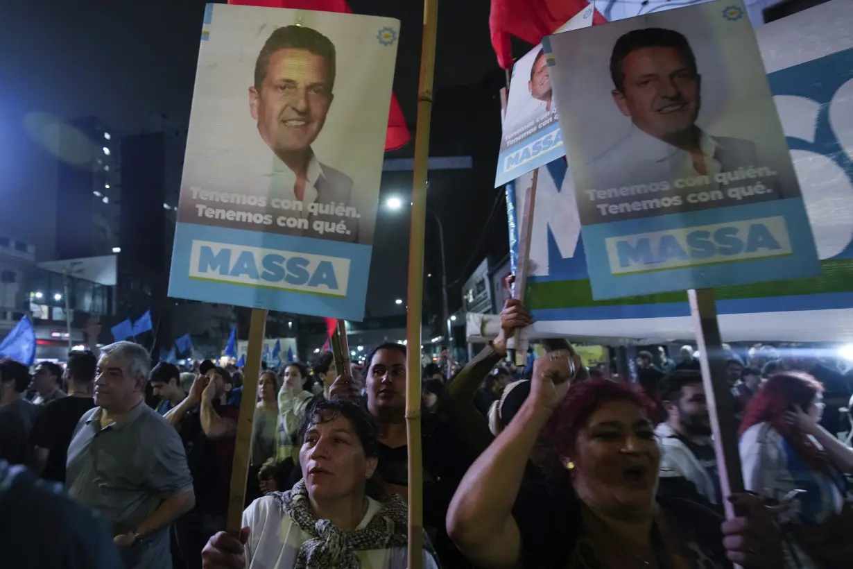 After presidential race surprise, Argentine economy minister and right-wing populist look to runoff