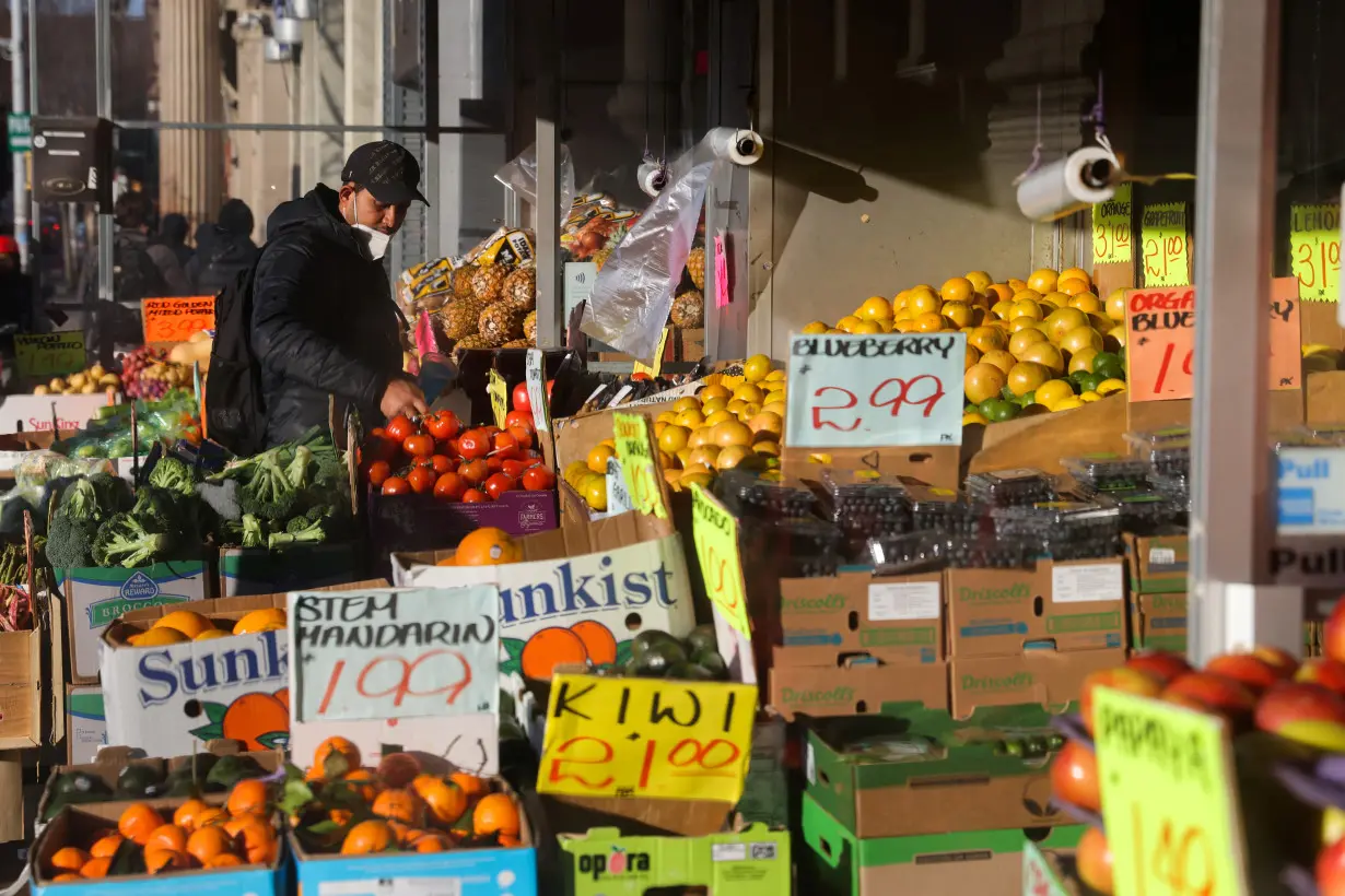 Prices of fruit and vegetables are on display in a store in Brooklyn, New York City