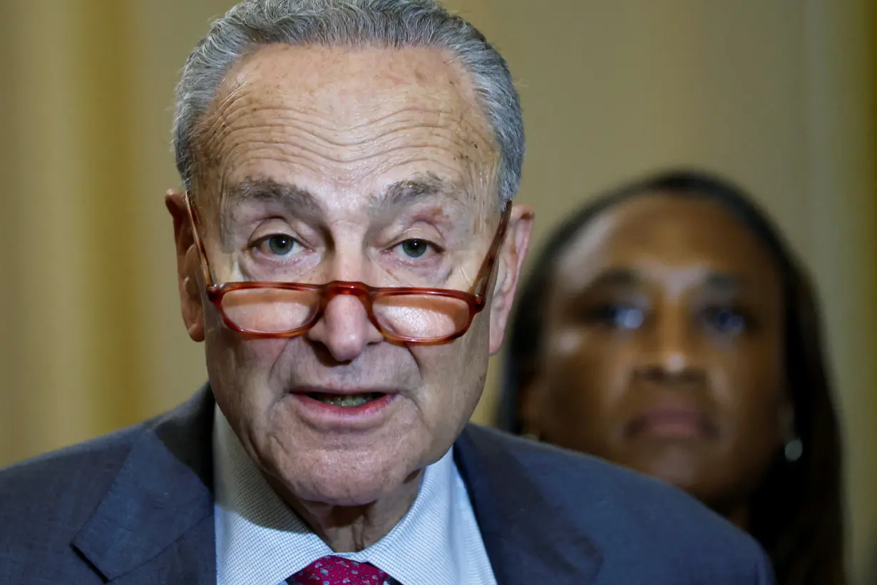 U.S. Senate Majority Leader Schumer, with Senator Butler, speaks to reporters at the U.S. Capitol in Washington