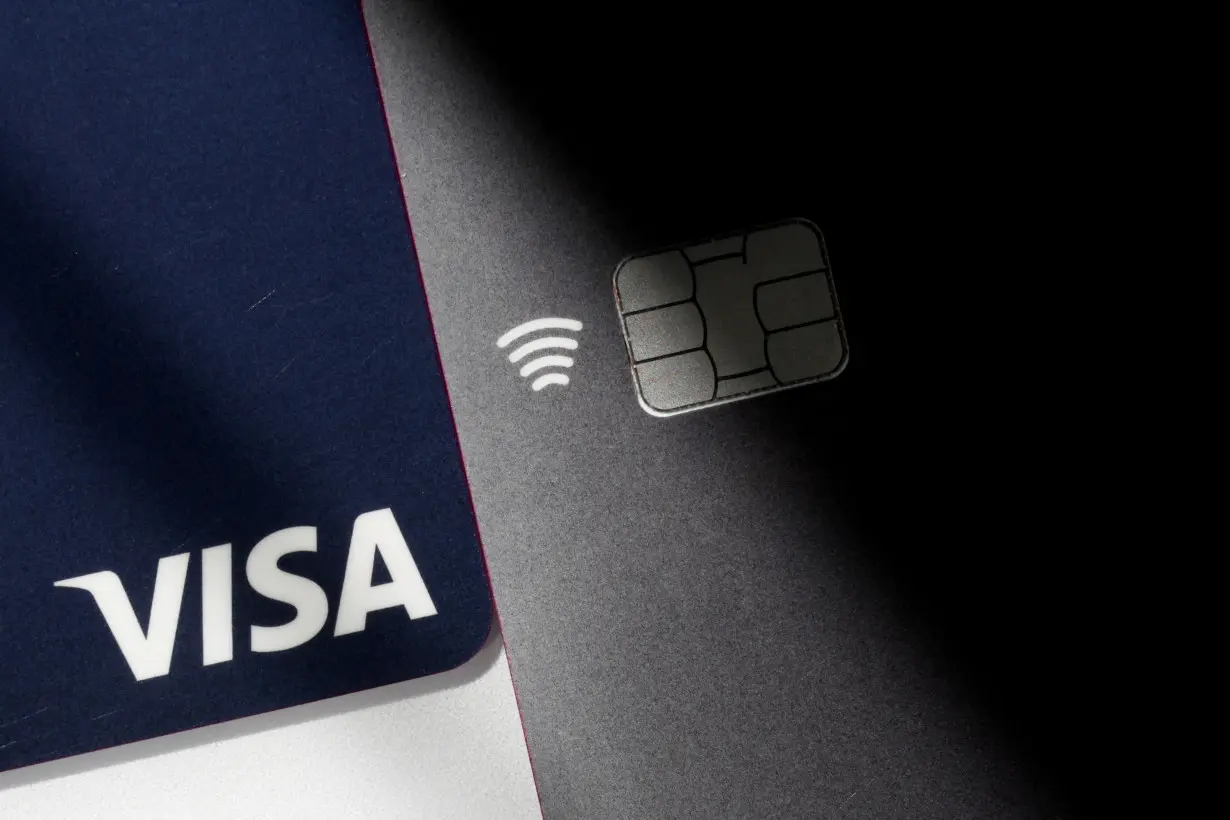 FILE PHOTO: Illustration of Visa credit and debit cards