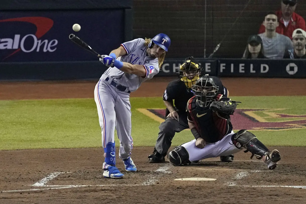 Rangers slugger Adolis García and pitcher Max Scherzer to miss the rest of the World Series