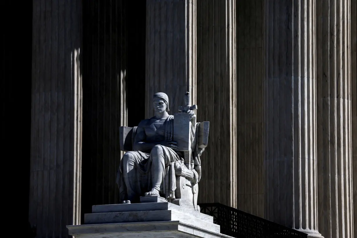 FILE PHOTO: The Authority of Law statue is seen outside the U.S. Supreme Court in Washington