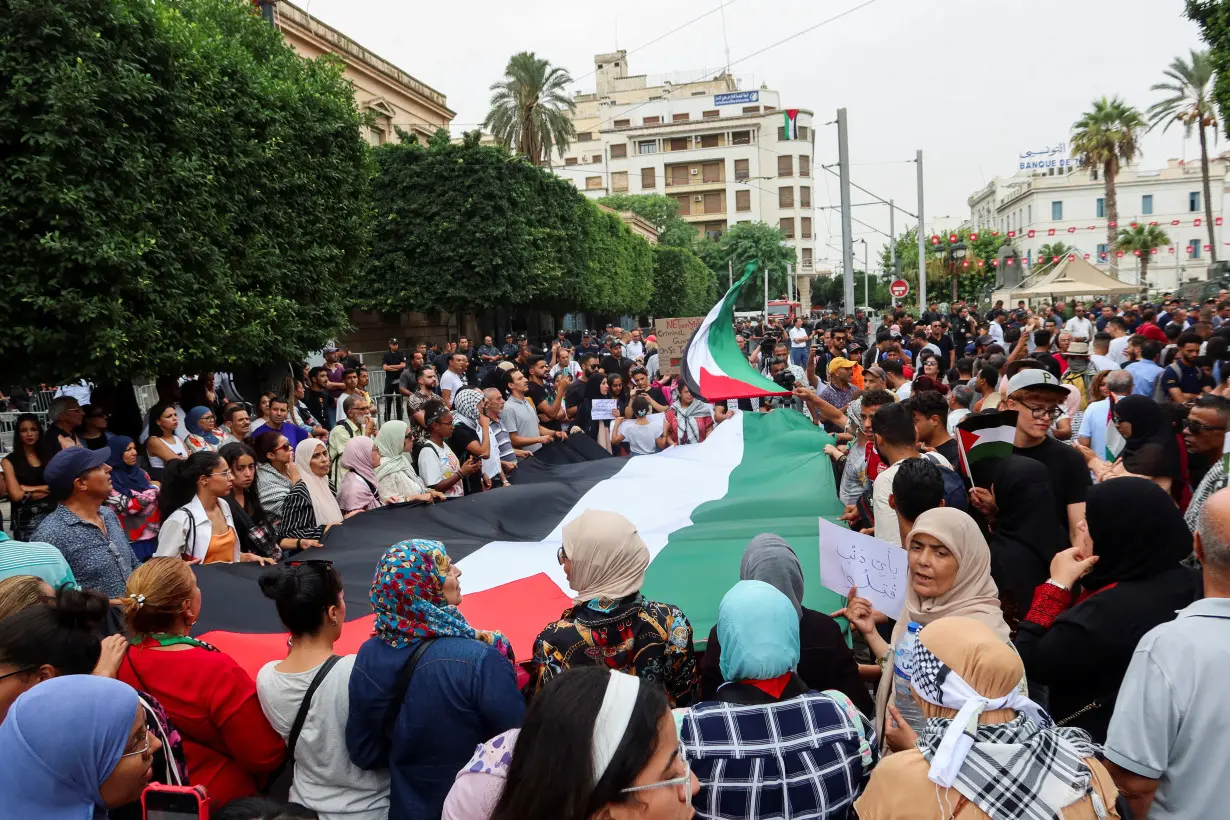 Tunisians gather during a pro-Palestinian protest to express solidarity with Palestinians in Gaza, in Tunis