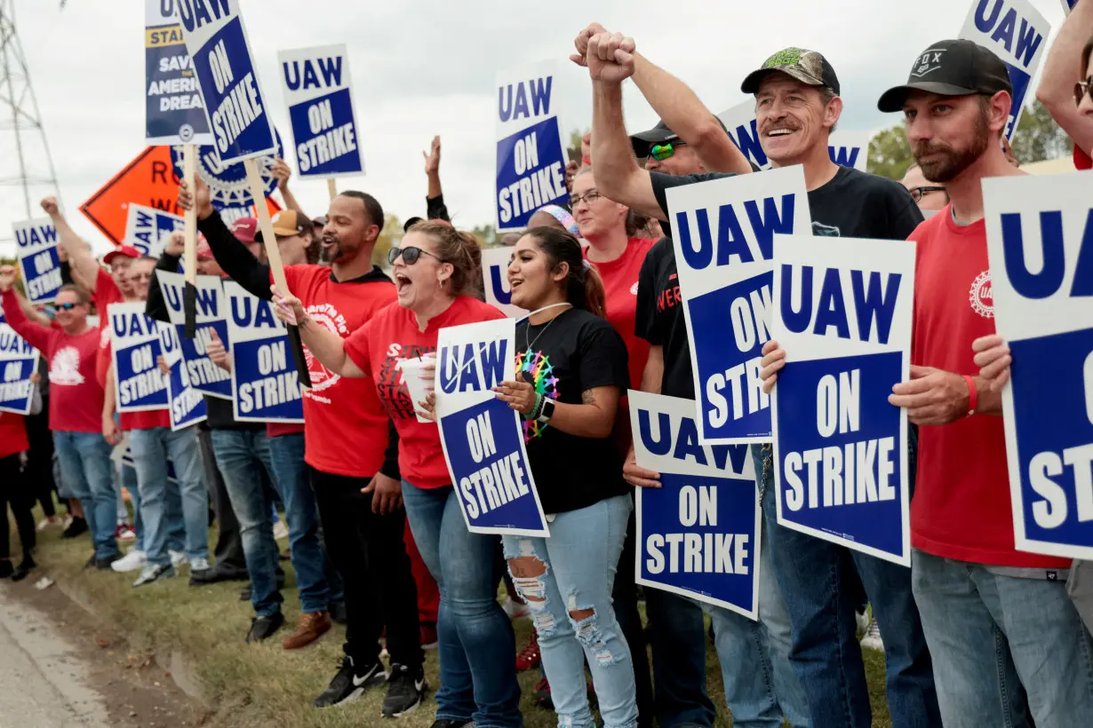 FILE PHOTO: Striking UAW members from the General Motors Lansing Delta Plant picket in Delta Township