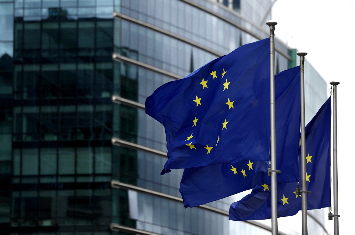 FILE PHOTO: European flags fly outside the European Commission headquarters in Brussels