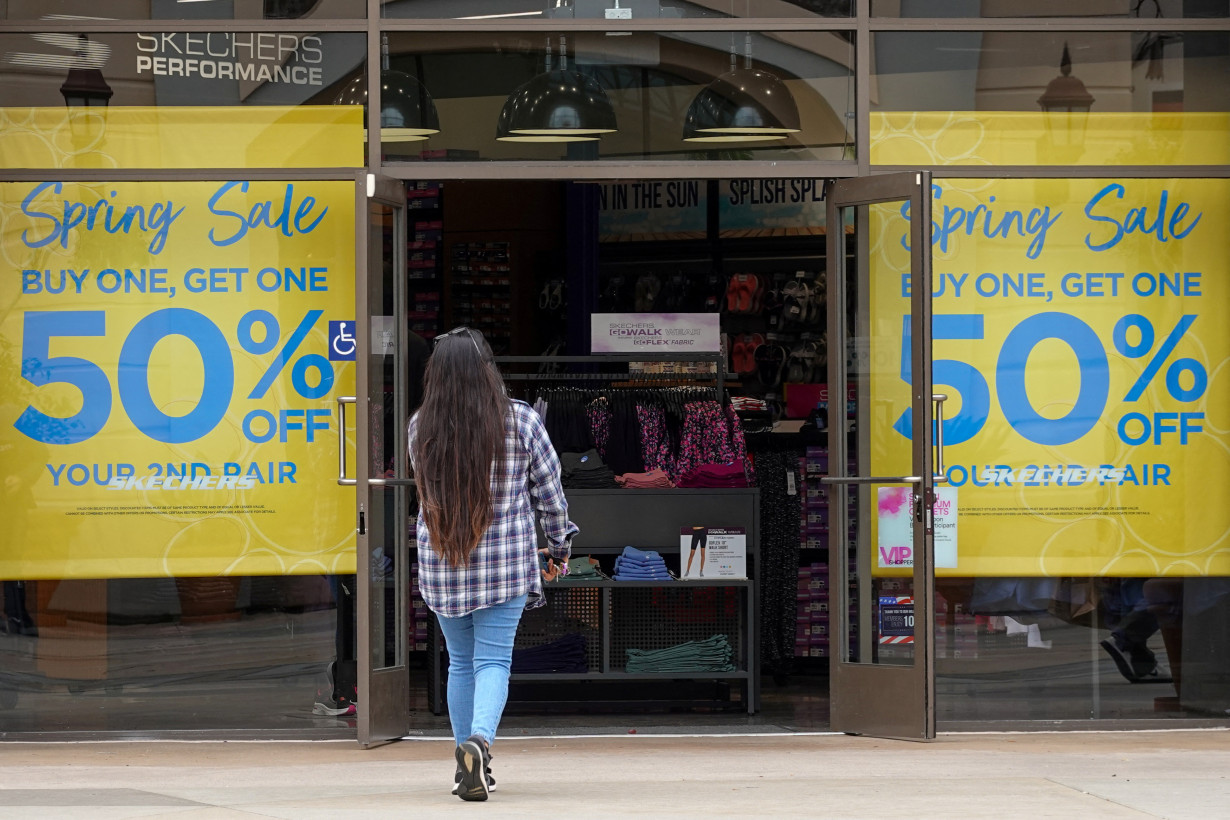 Sale signs greet shoppers at a retail store in California