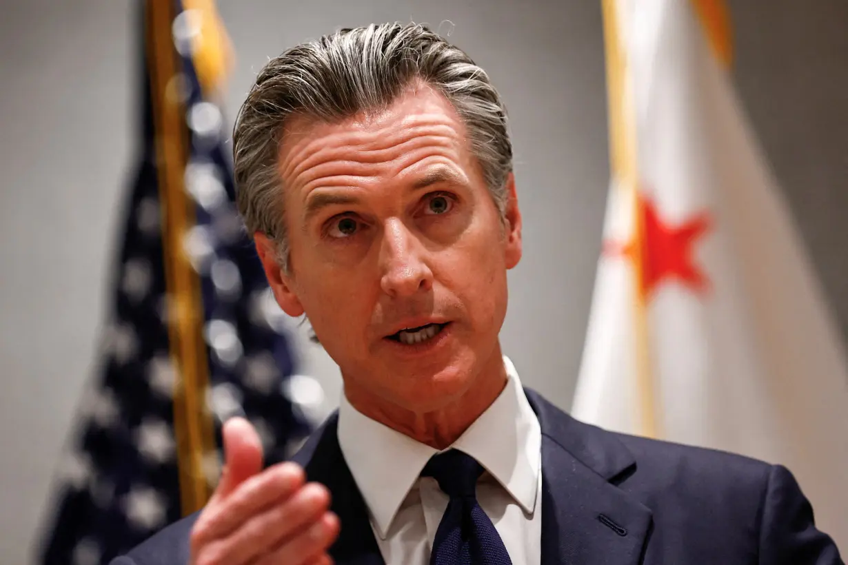 Governor of U.S. state of California Gavin Newsom speaks at a press conference in Beijing