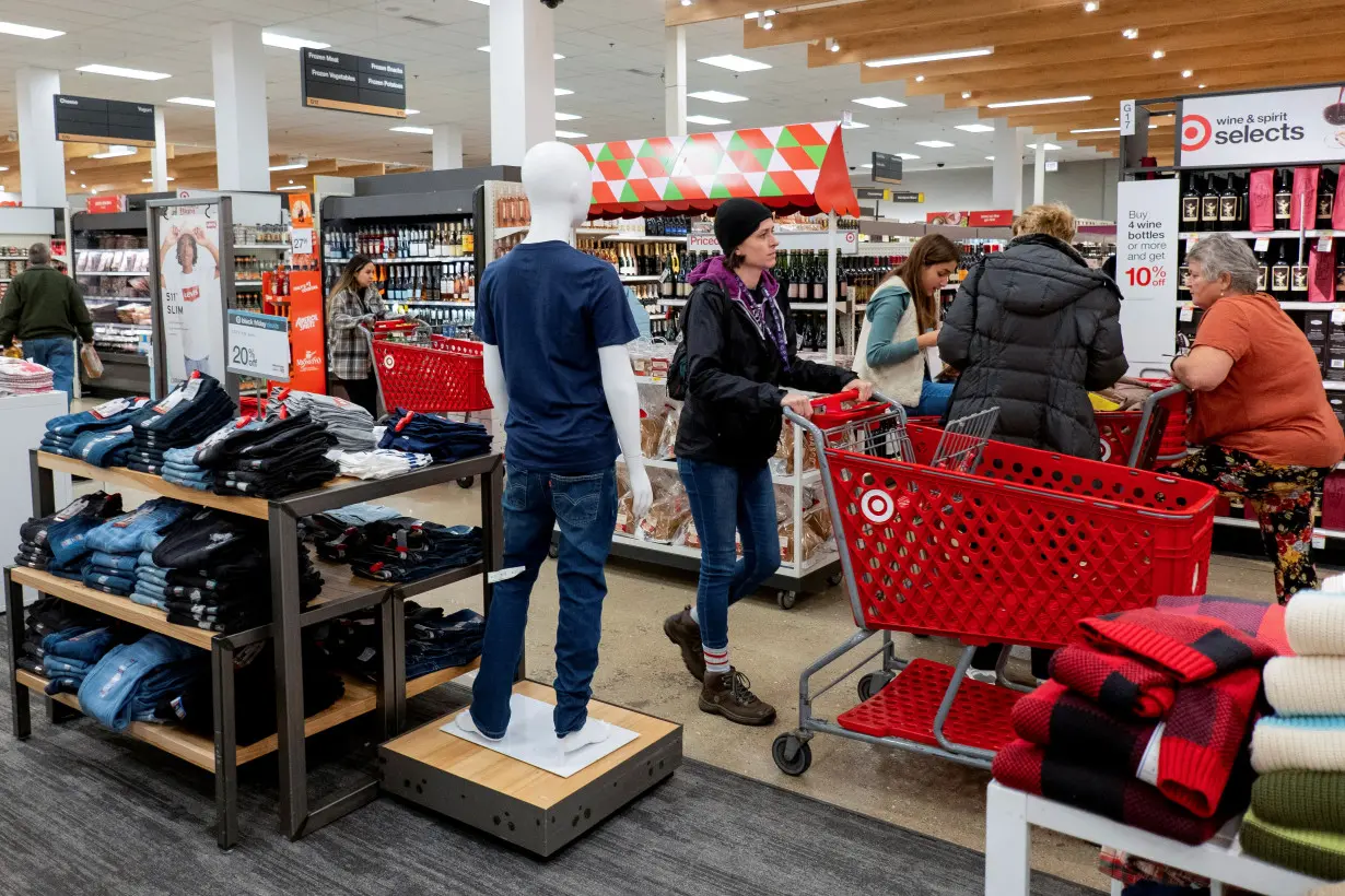 Shoppers converge in a Target store ahead of the Thanksgiving holiday
