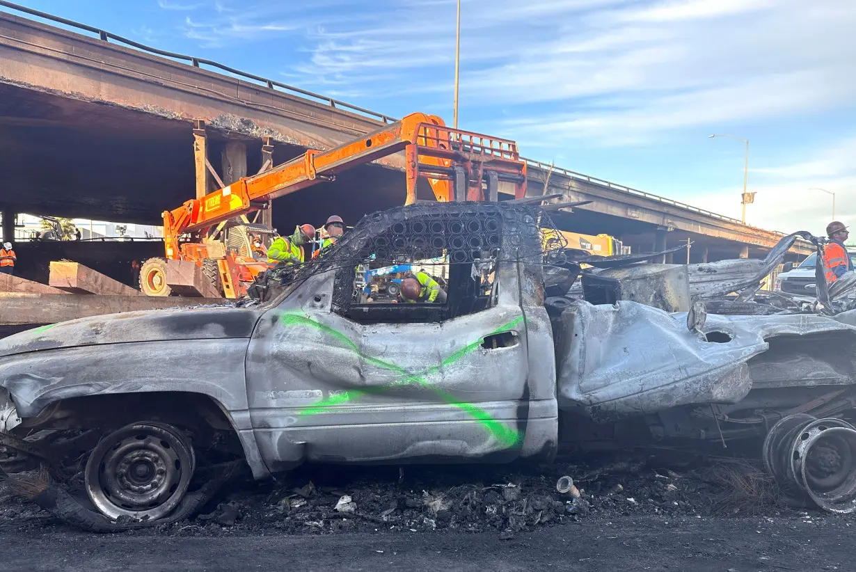 Aftermath of Interstate 10 freeway fire eruption in Los Angeles