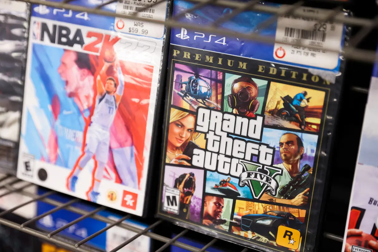 FILE PHOTO: NBA 2K22 and Grand Theft Auto 5 by Take-Two Interactive Software Inc are seen for sale in a store in Manhattan, New York City