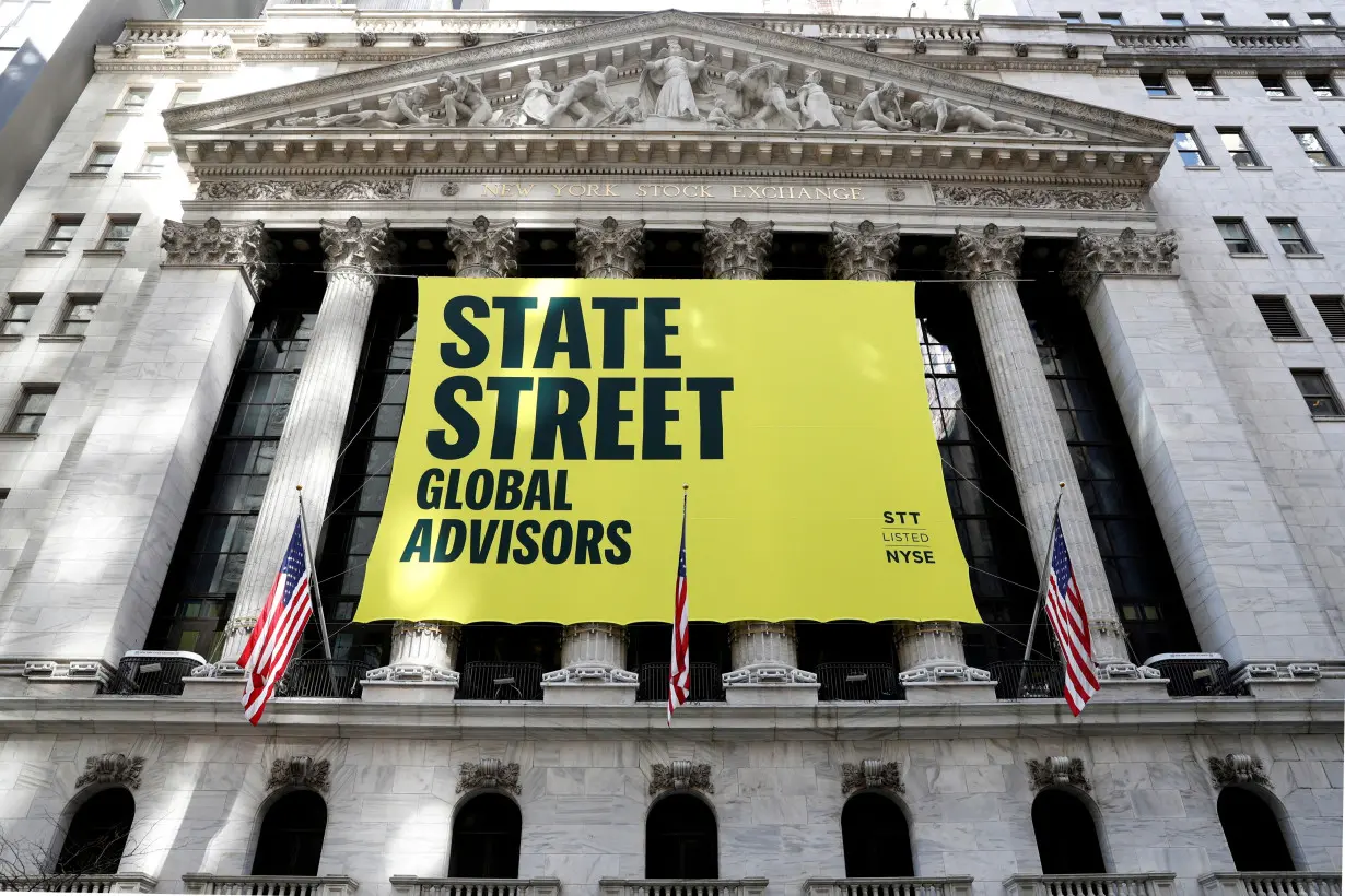 FILE PHOTO: State Street Global Advisors banner is hung outside the NYSE in New York