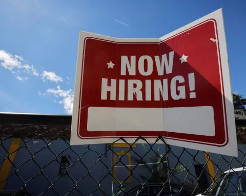 New US jobless claims edge down; continued claims on the rise