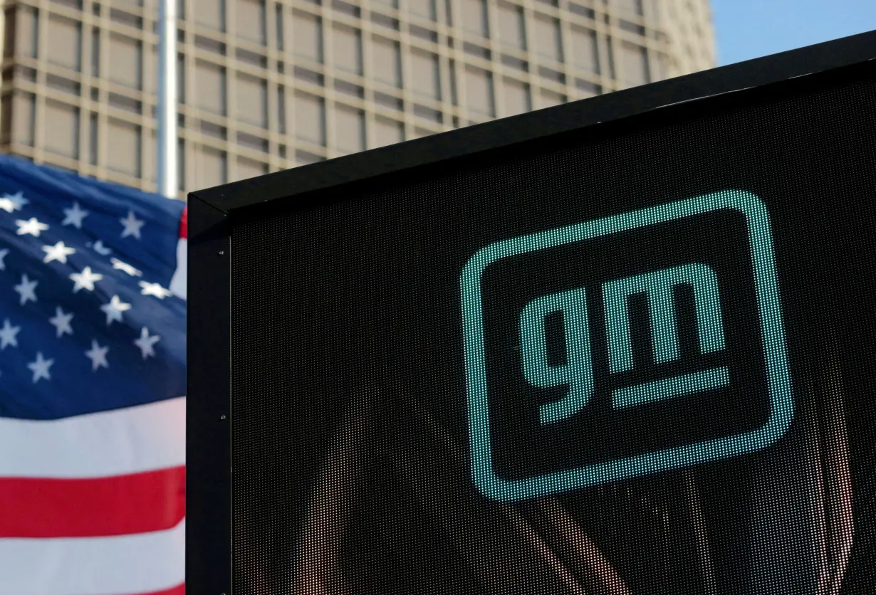 FILE PHOTO: Logo of GM atop the company headquarters