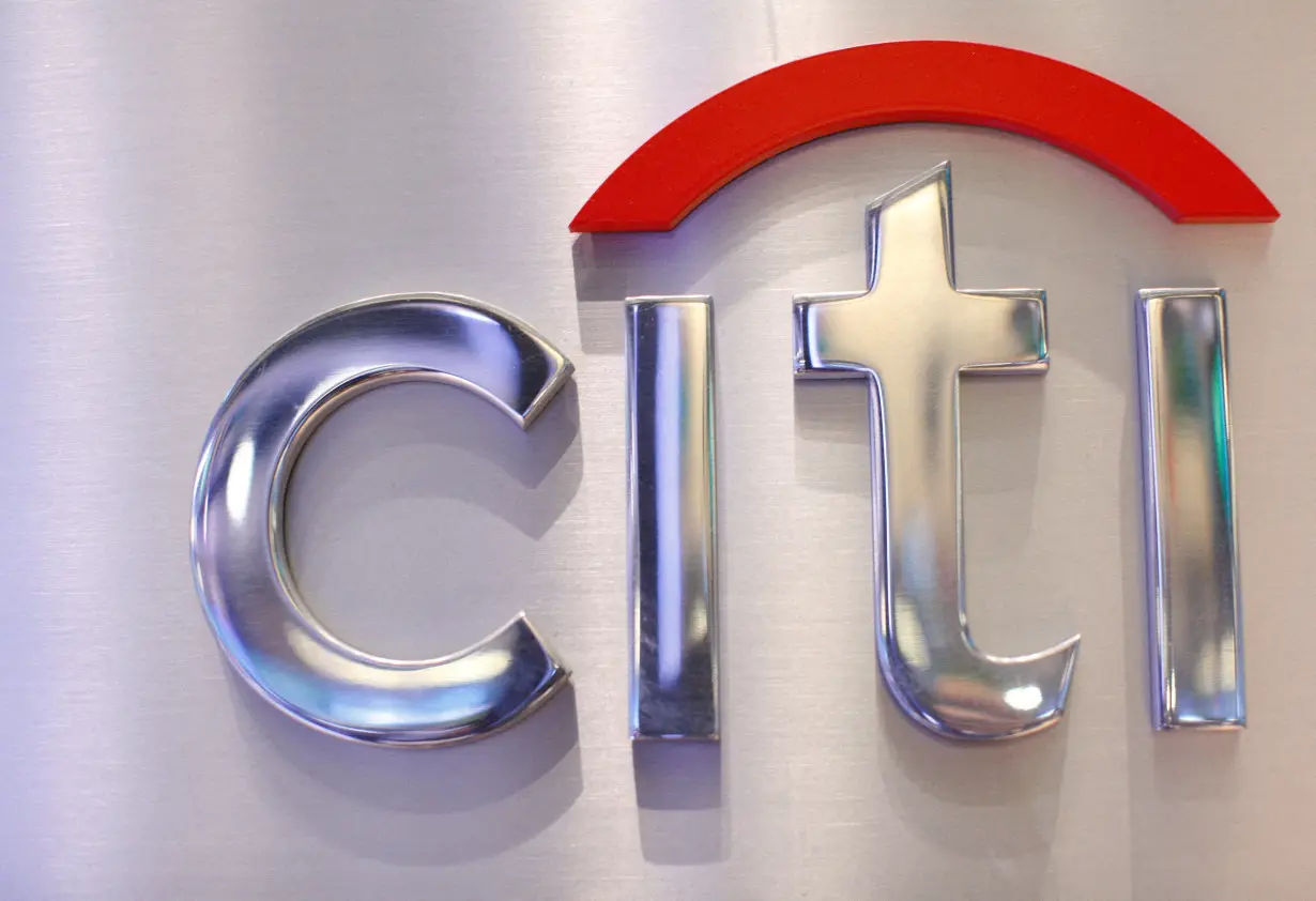 FILE PHOTO: A Citi sign is seen at the Citigroup stall on the floor of the New York Stock Exchange