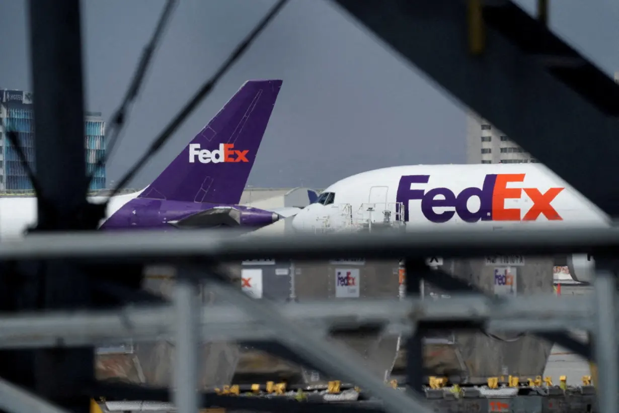 FILE PHOTO: FedEx air freight cargo planes parkedat Los Angeles International Airport (LAX) in Los Angeles, California