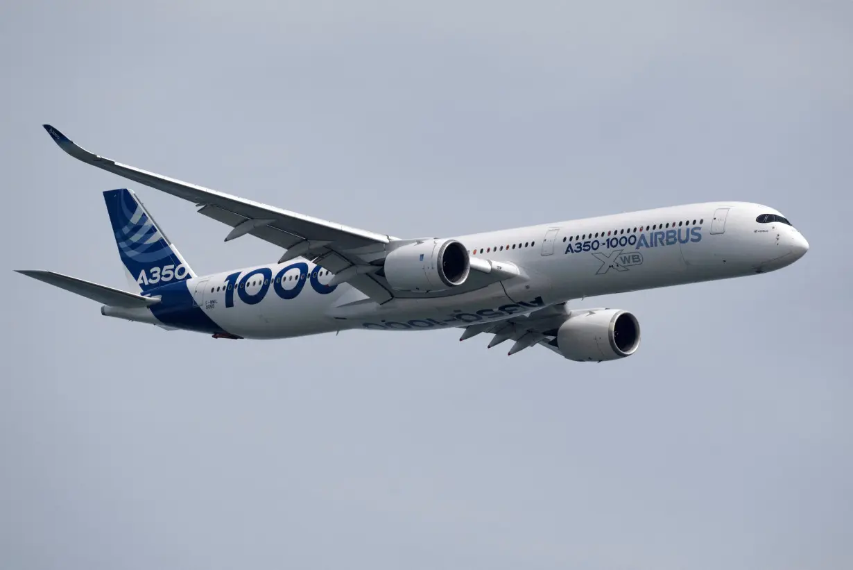 FILE PHOTO: The Airbus A350-1000 seen in the aerial display during the media preview of the Singapore Airshow in Singapore,