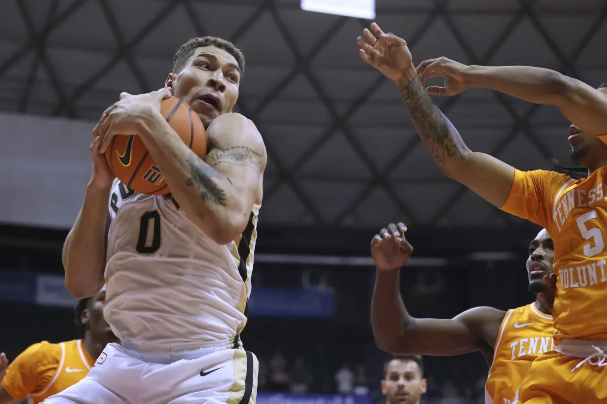 Loyer scores 27, Purdue pulls away late to beat Tennessee 71-67 in Maui Invitational