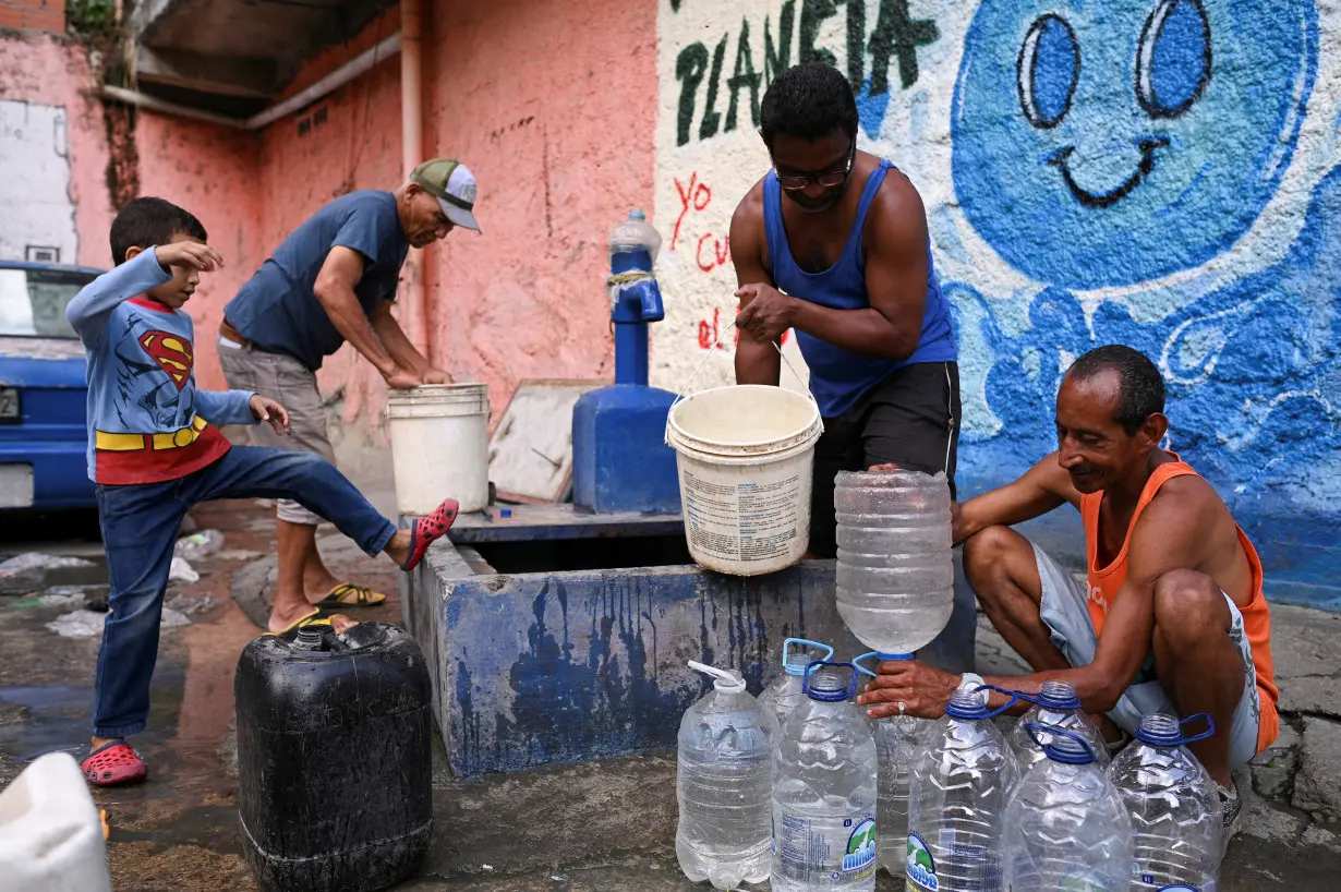 FILE PHOTO: Venezuelans face rising bills and poor services as government cuts spending