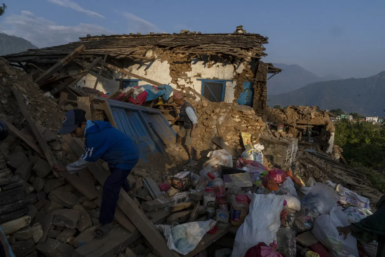 Nepal villagers cremate loved ones who perished in an earthquake that killed 157 people