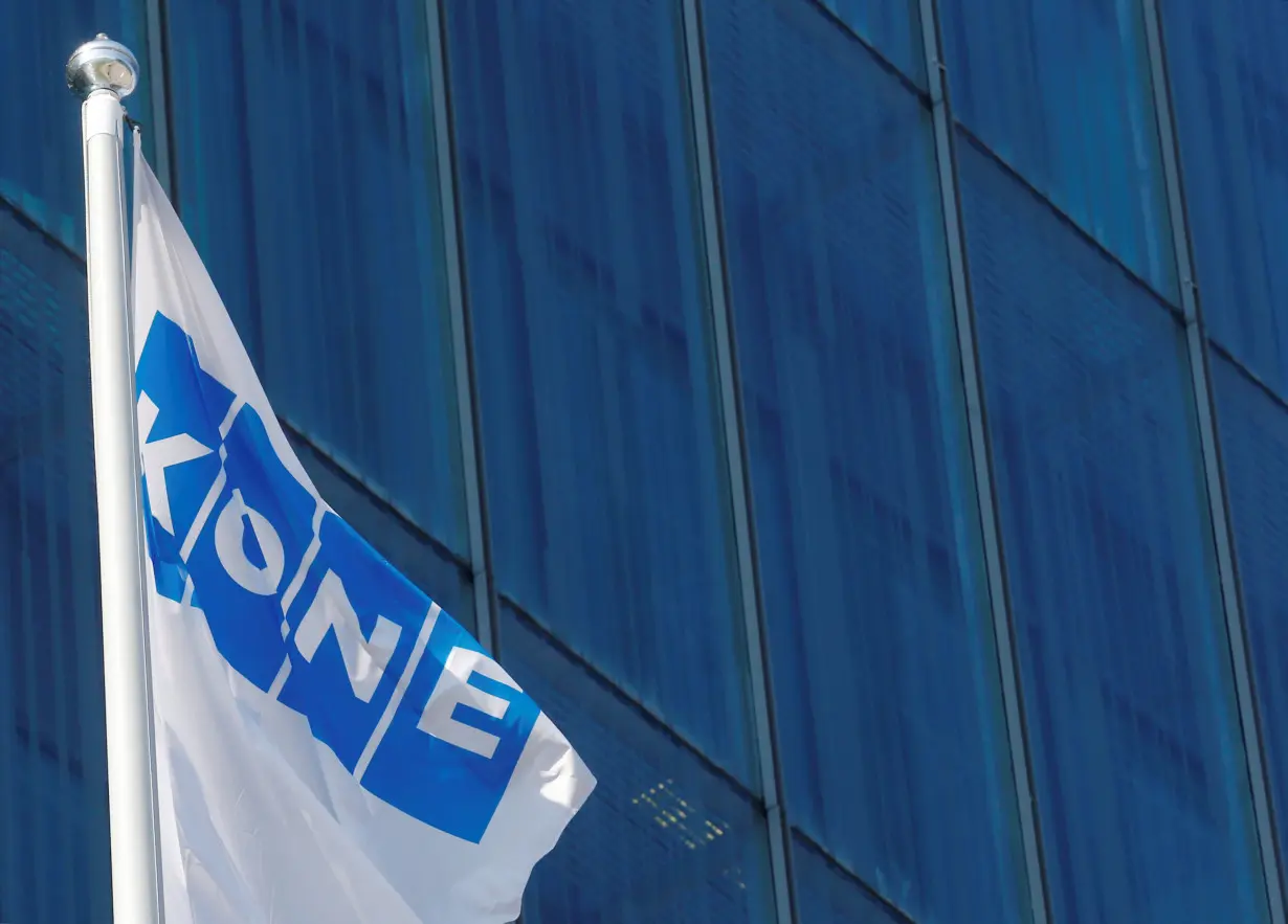 Finnish company KONE flag flutters at their headquarters in Espoo