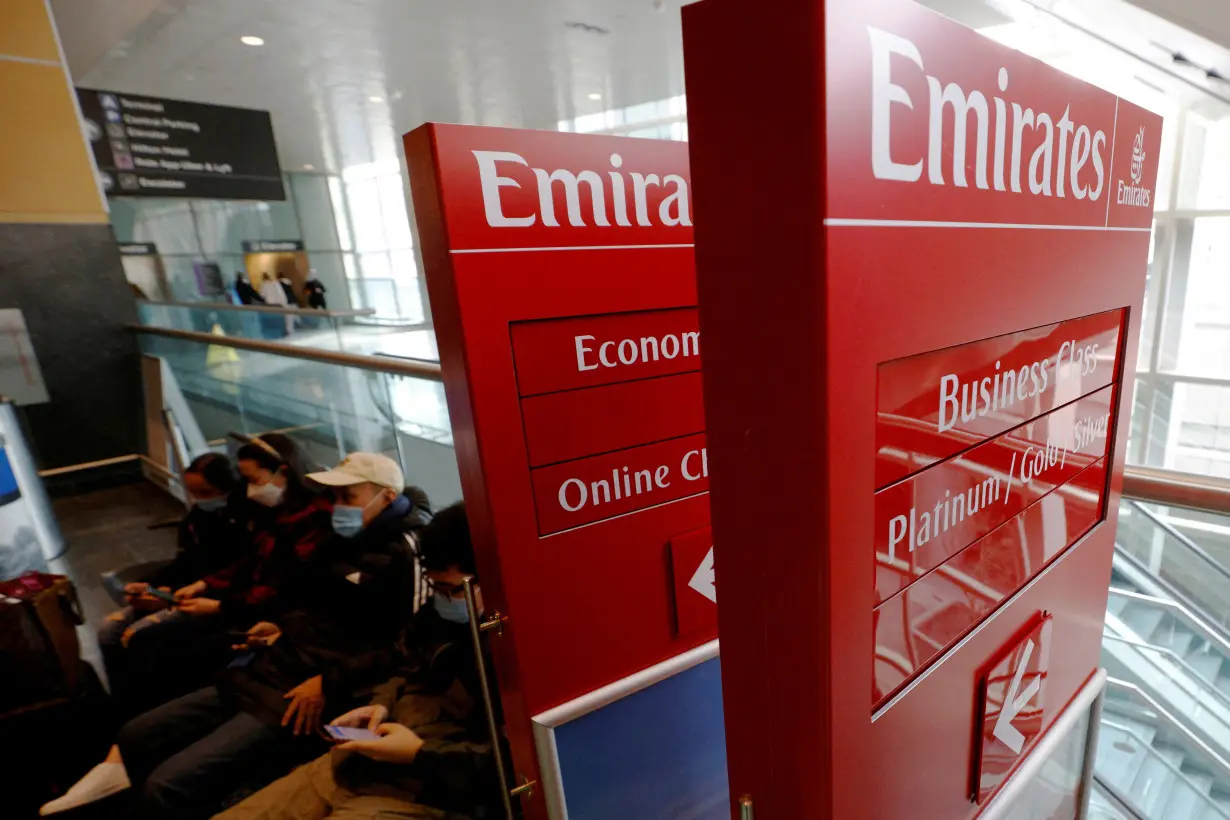 FILE PHOTO: Signs for Emirates airlines are stacked to the side at Logan Airport in Boston, Massachusetts