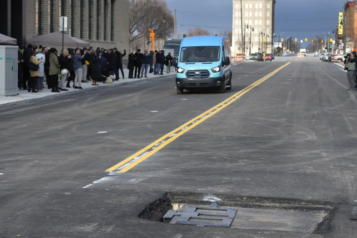 New technology installed beneath Detroit street can charge electric vehicles as they drive