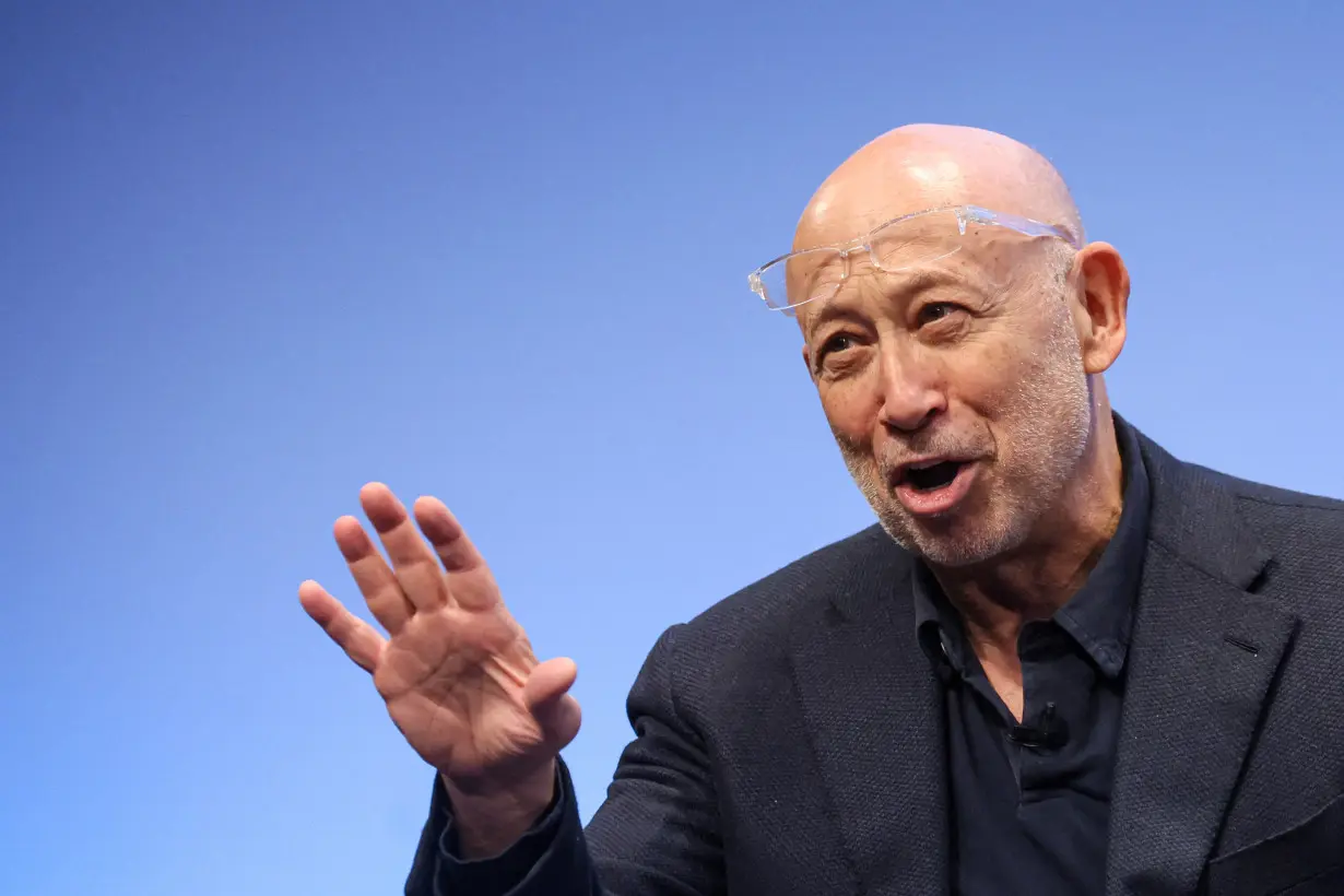 Goldman CEO and predecessor Blankfein talk careers as analysts compete