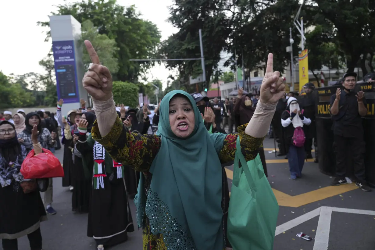 Conservative Muslims in Indonesia protest Coldplay concert over the band's LGBTQ+ support