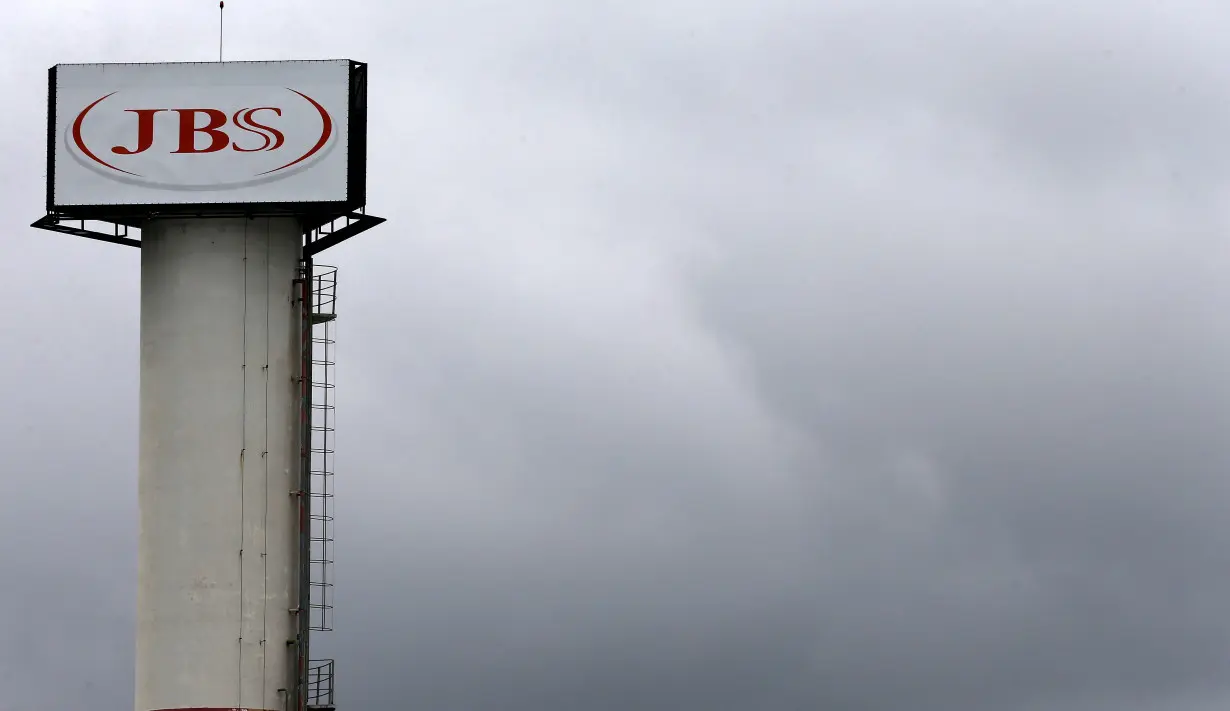 The logo of Brazilian meatpacker JBS SA is seen in the unit in the city of Jundiai