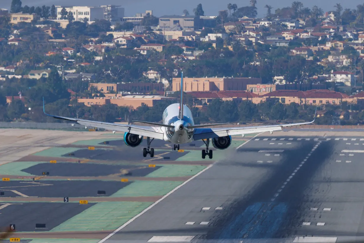 FILE PHOTO: Aircraft approaches to land in San Diego as 5G talks continue with telcoms