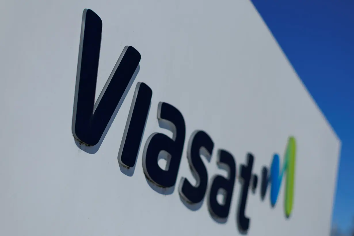 Viasat corporate logo is shown on a sign at the company's headquarters in Carlsbad, California