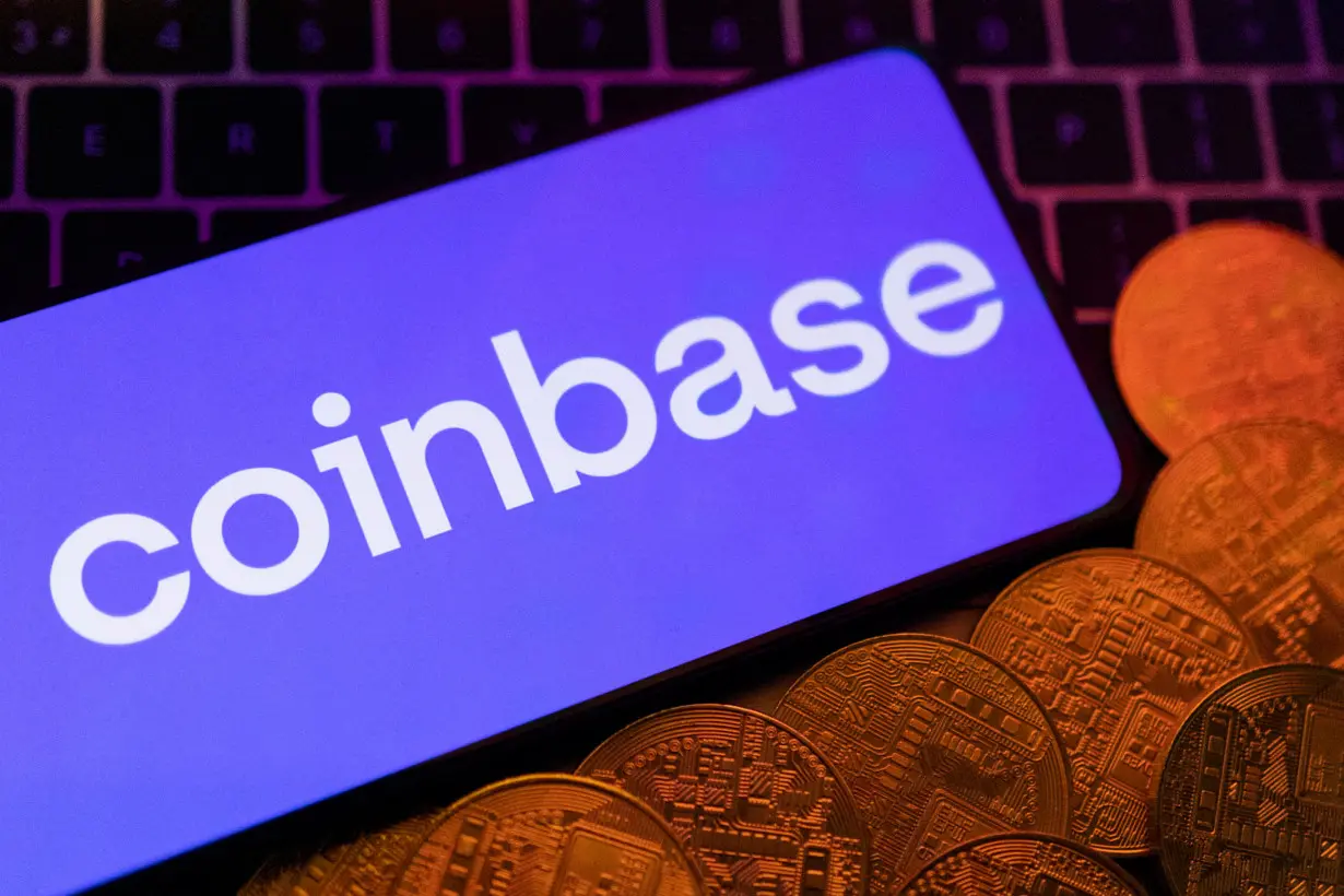 FILE PHOTO: Illustration shows smartphone with displayed Coinbase logo