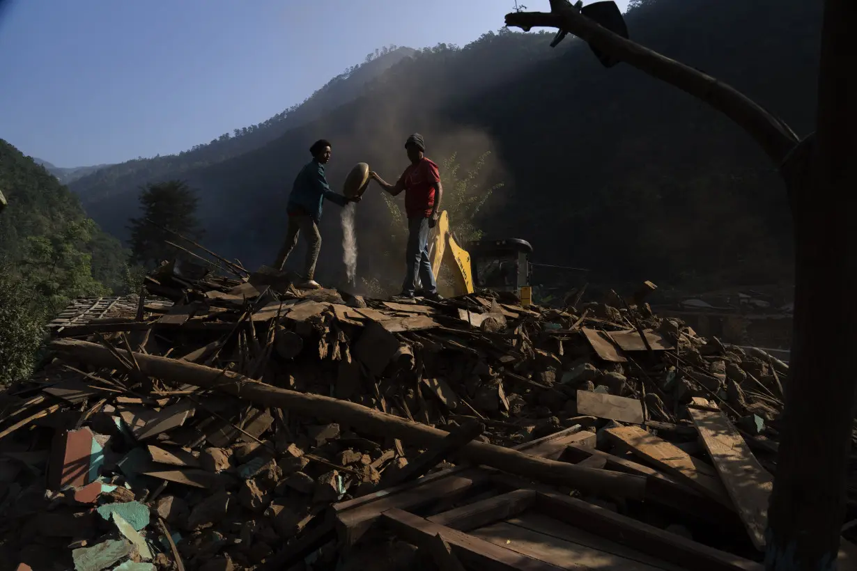 Aid trickles in as survivors salvage belongings from rubble in Nepal villages struck by earthquake