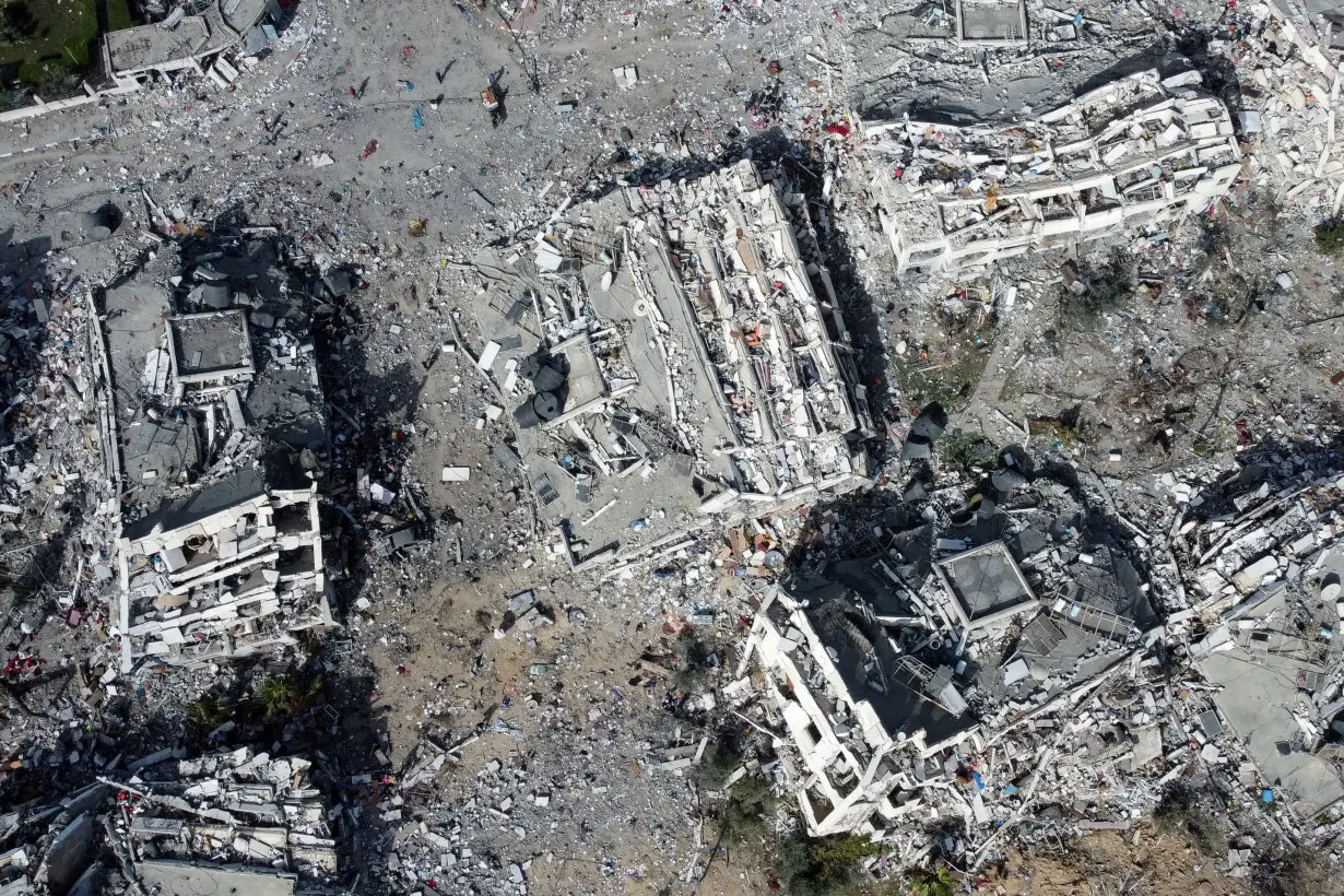 Residential buildings, destroyed in Israeli strikes during the conflict, lie in ruin, in Gaza City