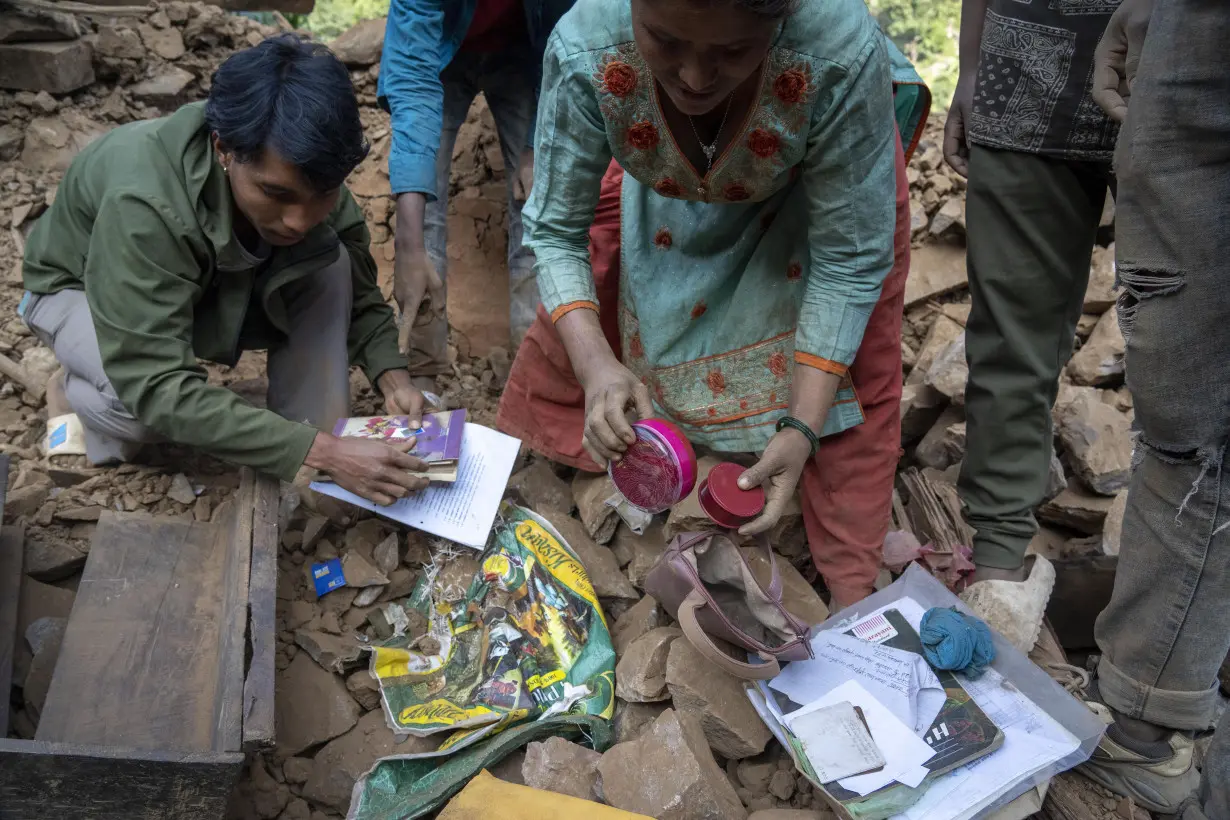 Aid trickles in as survivors salvage belongings from rubble in Nepal villages struck by earthquake