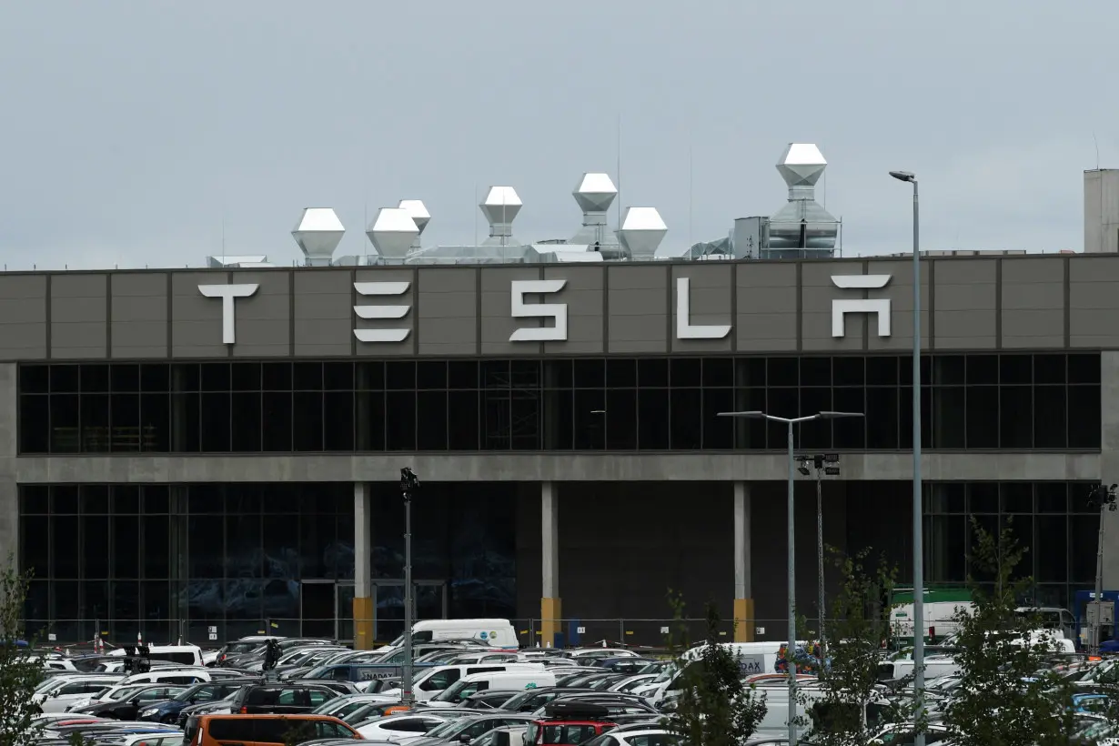 A general view shows the Tesla logo on the Gigafactory in Gruenheide