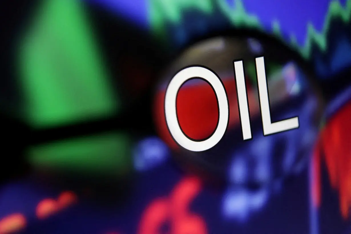 FILE PHOTO: Illustration shows word "Oil" and stock graph