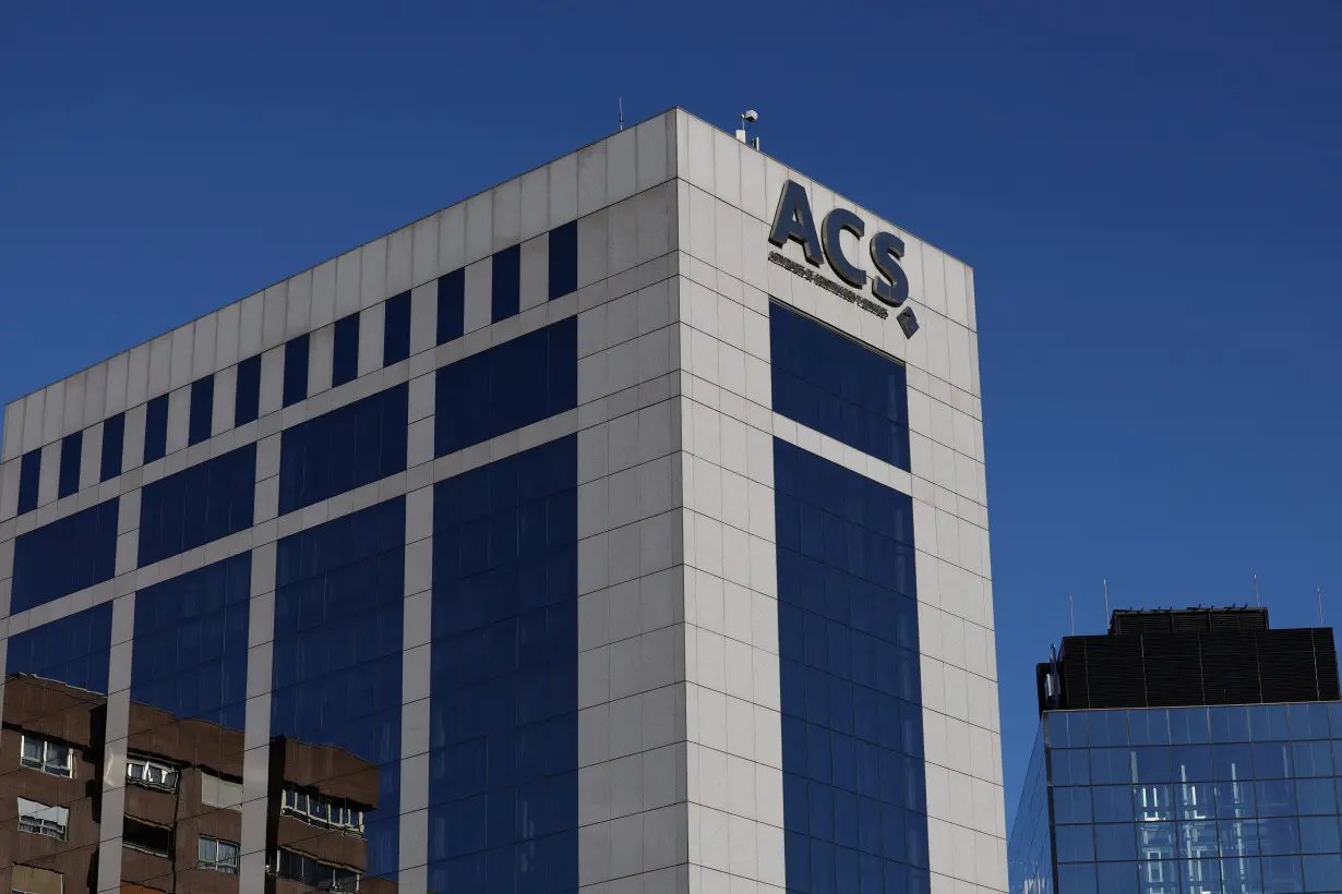 The logo of Spanish construction conglomerate ACS is displayed on the company's building in Madrid