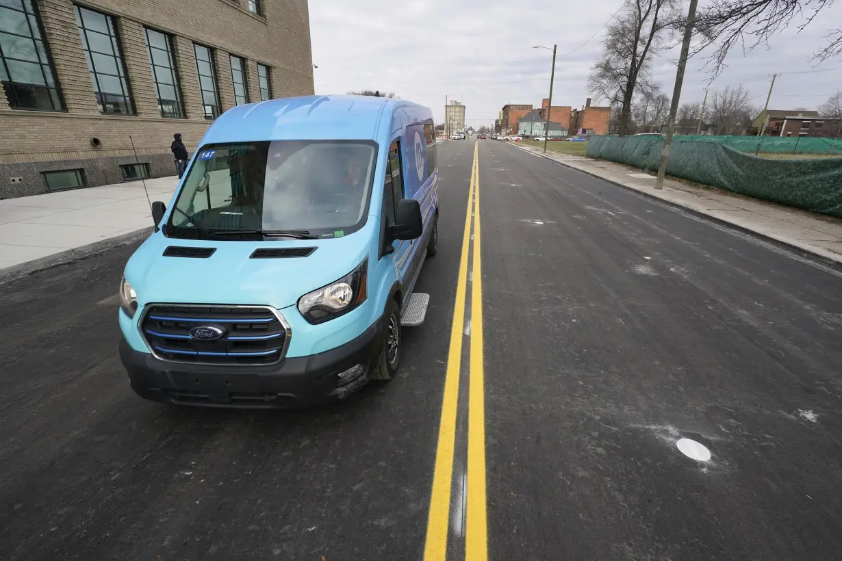 New technology installed beneath Detroit street can charge electric vehicles as they drive