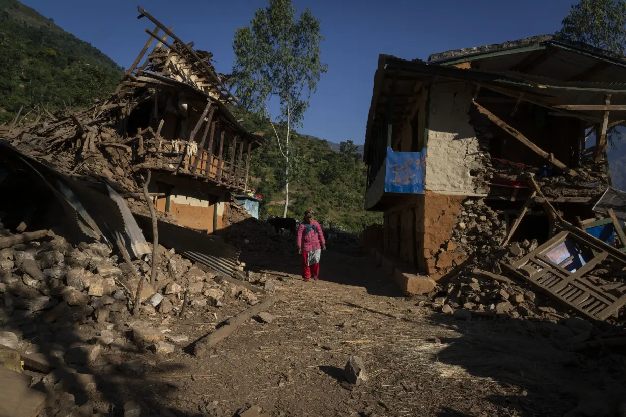 Nepal villagers cremate loved ones who perished in an earthquake that killed 157 people