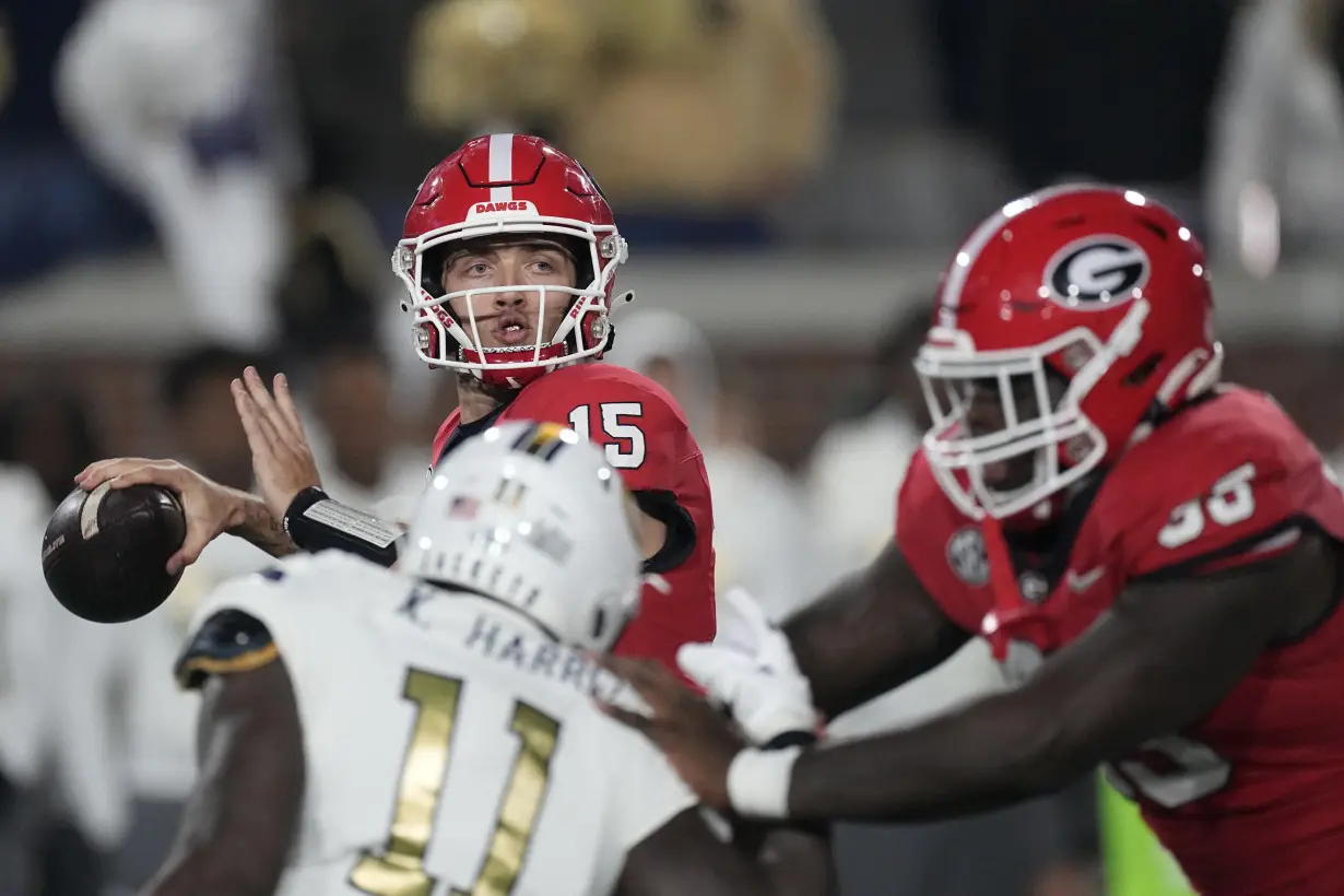 Georgia's Beck, Alabama's Milroe lead teams to SEC title game after replacing big-name QBs